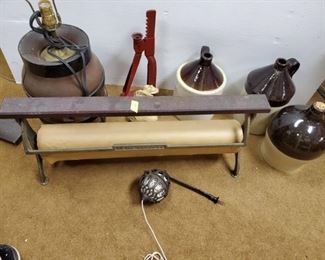 Country Estate Items.  This variety includes 3 vintage glass jugs, a vintage paper cutter, a vintage wagon wheel lamp, etc.