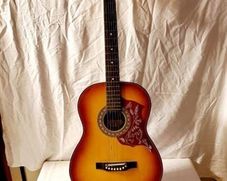 Global Acoustic Guitar.  Very beautiful guitar with painted detailing on the body.