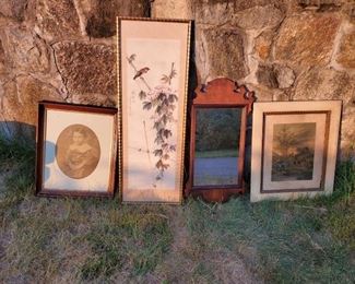 Estate artwork including vintage baby photography, oriental print, framed landscape and Queen Anne style mirror.
