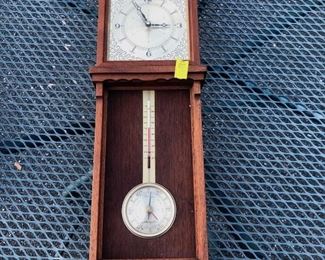 Decorative regulator clock with thermometer and barometer. Battery operated.
