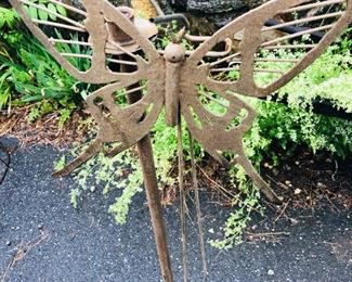 Garden Iron Trees.  With a butterfly watering can and candle holder. These are iron trees with rock weights.