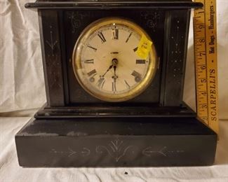 E. Ingraham and Company marble mantel clock with incising. Manufactured in Bristol Connecticut.