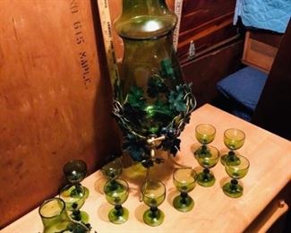 Green Glass wine decanter set with decanter, matching glasses.