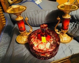 Art Deco candle holders and ruby glass covered jar.