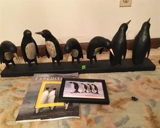 Decorative Penguin statue with National Geographic and Penguin photo.  Measures approx. 31.5 inches long (ce) Sat-Lot #92