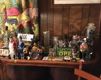 Estate lot of collectibles including bar figurines, pitchers, shot glasses, collectibles, also including wooden mask. (ce) Sat-Lot #97