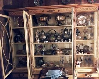 Entire estate contents of breakfront including silverplate, chaffing dishes, crystal, flatware, decorative plates, glassware, etc. All being sold as found. (ce) Sat-Lot #101