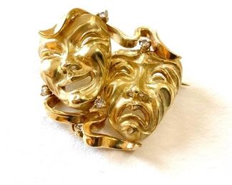 18kt gold Comedy/Tragedy Mask Brooch with 5 2.2mm round faceted diamonds. Approx. 0.22ctTW. 24.6 grams or approx. 15.82 dwt. (ce) - Sun Lot #1
