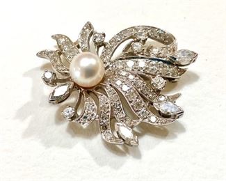 14kt White Gold diamond and pearl brooch/Pendant.  Genuine 7.2mm pearl with good luster and clean nacre, 4-5x2 Marquise (approx. 0.20pt each) cut diamonds, 6-2.5mm round diamonds prong set, 57 pave set diamonds graduated from 0.01pt to 2.2mm (0.04pt).  Very clean, white diamonds.  approx. TW - 2.7 carats.(ce) - Sun Lot #5