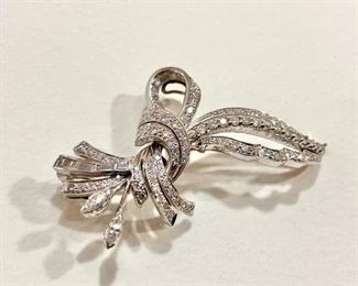 14kt White Gold Diamond Brooch/Pendant 2-2.3mm x 5mm Marquise diamonds, 4-tapered baguette diamonds and 99 graduated (1 diamond missing) round pave and prong set diamonds 0.0001-0.02pt. Approx. 2.58ct. TW. (ce) - Sun Lot #7