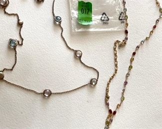 Two (2) necklaces with multi-semi precious stones.  One marked .925.  Genuine Peridot, Garnet, Citrine and Blue Topaz. One measures approx. 27 inches and the other measures approx. 28 inches. (ce) - Sun Lot #17