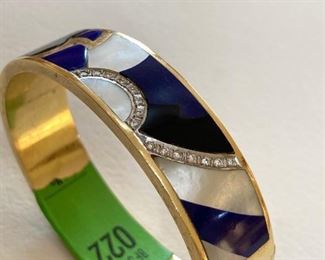 18kt Gold Bangle style cuff bracelet with genuine lapis, Back Onyx and Mother of Pearl. 16 diamonds (o.02pt) pave set.  Approx. 0.32ct. 50 grams (orapprox. 32.15 dwt). (ce) - Sun Lot #22