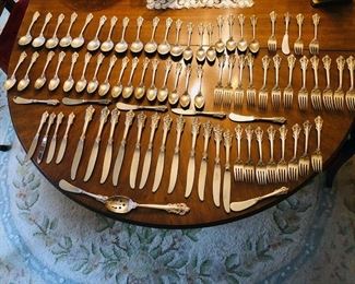 Sterling Silver Wallace Grande Baroque Flatware Set. 83 pieces total; 12 Soup Spoons, 23 Tea Spoons, 20 Forks, 12 Knives, 12 Butter Knives, 3 Small Forks, 1 Serving Spoon. (ce) - Sun Lot #30