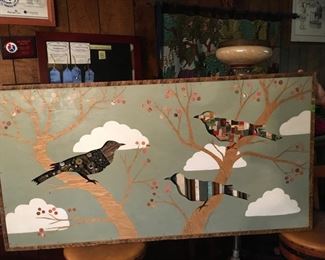 Dolan Geiman, signed original mixed media.  An original mixed media art piece featuring a trio of birds composed of book covers, rescued wood, nails + industrial relics perched in (cherry) tree branches. Signed Dolan Geiman 2015. Measures approx. 56 inches x 29 inches. (ce) - Sun Lot #46