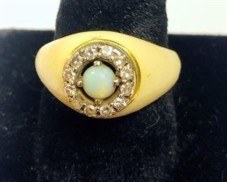 18kt Gold vintage diamond, opal and enameled ring. 12 diamonds surround opal center stone, marked k18, 880, weighs 5.8 dwt, Ring size is 7.5 - Sun Lot #51A