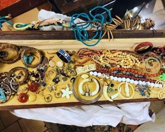 Estate jewelry including beads, semi-precious stones, giraffe bangle bracelets, necklaces, earrings, etc. Case is not included. - Sun Lot #66A