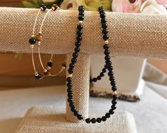 Vintage estate beaded necklace, black onyx beads with 14k fish hook clasp, measures approx. 18”.2 beaded bracelets. - Sun Lot #68A