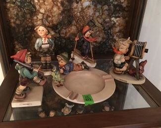 Estate Collection of 5 Hummel figurines including Ashtray with Boy and Bird, Volunteer, The Photographer, Skier, and Brother Boy with Hands in Pockets.  Hummel by W. Goebel, W. Germany. (ce) - Sun Lot #73