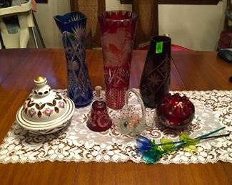 Cranberry cut glass including vase with American eagle, 2 vases, bowl and bell.  Cut blue glass vase, Czech Bohemian covered candy dish enamel over amberglass, artglass basket, and glass flowers. (ce) - Sun Lot #79
