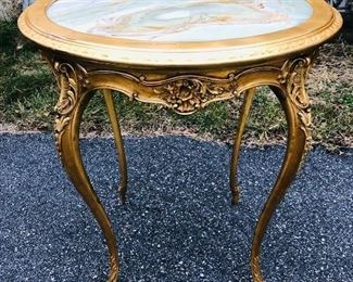 RJ Horner Marble Top Center Table, Paper Label: RJ Horner and Co. Furniture Makers, West 23rd Street, NY, beautiful label. Marble top French style with original gold gilting center table with alabaster style round marble. Measures approx. 30 inches tall x 26 inches round. - Sun Lot #91