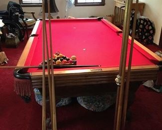 Olhausen Billiards Table, with red felt, fringed pockets, brass pool cue rack with agate top, billiard table hanging light, cues, balls, table cover, all being sold as one package! (ce) - Sun Lot #57