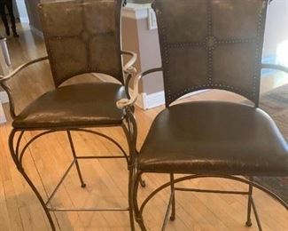 # 11 $43.50 each was $174             (2) Hooker Furniture Bar Stools metal with leather seat. Seats and arms have some wear as shown.  44"H x 22"W x 17"D 	
