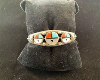 $120  John McZuade (Zuni) sterling sunface cuff, 1972
