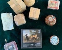 Stocking stuffers:   (4) Chinese wooden puzzles $5 (SOLD); box of Coprolite (dino poop) $5 (now $3); small cloisonne lidded round box $10 (now $8); small Millefiori paperweight $10 (now $8); museum wooden jigsaw puzzle $5 (now $3); clear music box $5 (SOLD)