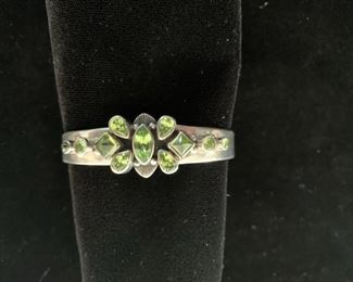$110 R. Bennett (Navajo) sterling and peridot cuff