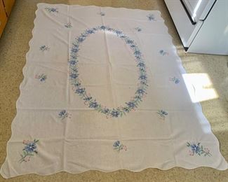 CLEARANCE!  $8.00 NOW, WAS $24.00..................Hand Stitched Tablecloth 64" x 50" few small stains (P365)