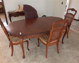 Free dining table with four chairs one leaf and table pads