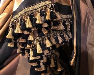DETAIL OF DRAPERY FABRIC & TASSELS