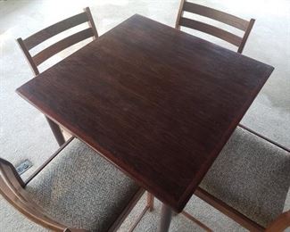Danish modern Bruksbo rosewood extension table w/ 4 chairs