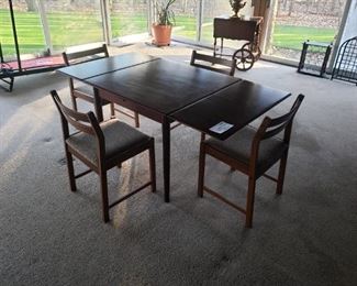 Danish modern Bruksbo rosewood extension table w/ 4 chairs