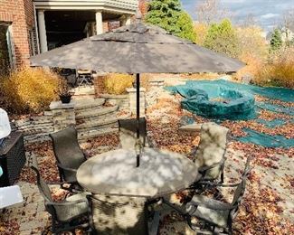 $350 TROPITONE PATIO FURNITURE 
ROUND TABLE WITH 6 CHAIRS / UMBRELLA 
TABLE MEASURES 62" DIA x 28"H
CHAIR MEASURES 25"W x 22"D x 41.5"H