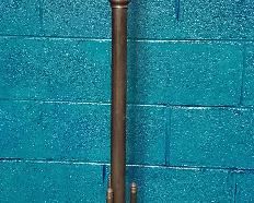 Antique brass coat rack