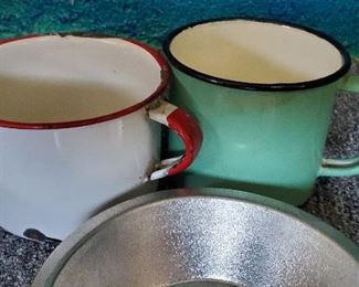 Pair of vintage enamel mugs
