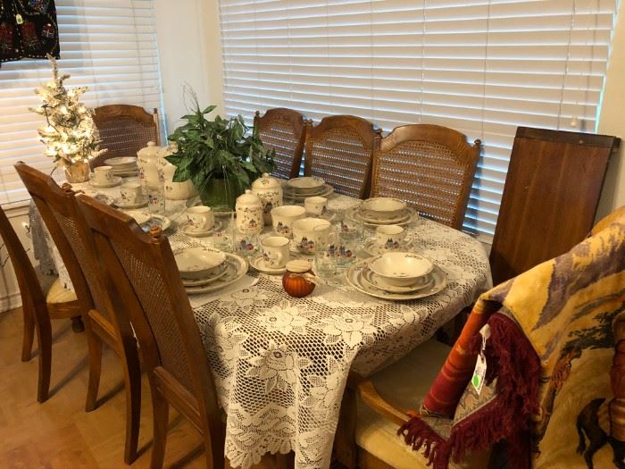 Dining table w/several leaves, 8 chairs.  Set of International China "Homestead"