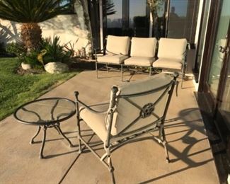 3 piece cast patio set. Estimate $1500