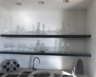 Decanters & glasses. Estimate $500