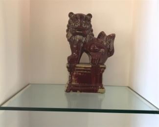 Pair of foo dogs. Estimate $1200
