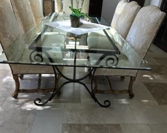 Glass top table, 113" x 50". Estimate $4500