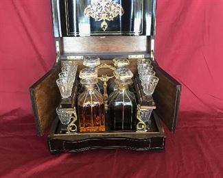 Antique liquor caddy Estimate $2200