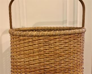 Item 17:  Woven basket on bun feet signed Judith Richmond Spates - 11.5" x 22.5":  $125.00