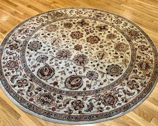 Item 23:  Wool rug - shows some signs of wear - 66.5":  $275