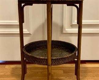 Item 31:  Woven wicker table with decorative, cork-style surfaces:  - 17.75"l x 1.5"w x 14.75"h:  $175