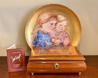 Item 75:  Hibel plate (Golden's Child) and Italian Music Box (Reuge-The Magic Flute): $70                                                    Plate - 9.5"                                                                                                                  Music Box - 7.75" x 3"