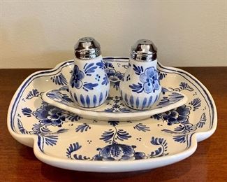 Item 82:  Delft salt and pepper set with small tray:                           Salt & pepper - 3"                                                                                               Small tray - 7.75". :  $22.00