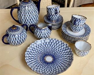 Item 96: Lomonosov m USSR tea set:                                                                                     5 tea cups, 6 saucers, 6 dessert plates, 1 large teapot, 1 creamer & sugar, 1 serving bowl:  $285