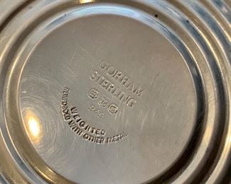 Detail of Gorham Sterling weighted candlesticks